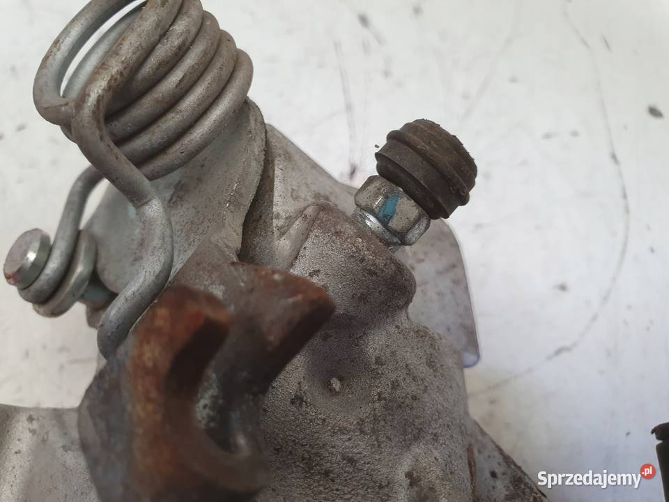 Volvo V40 II TYLNY ZACISK HAMULCOWY lewy tył Chełm