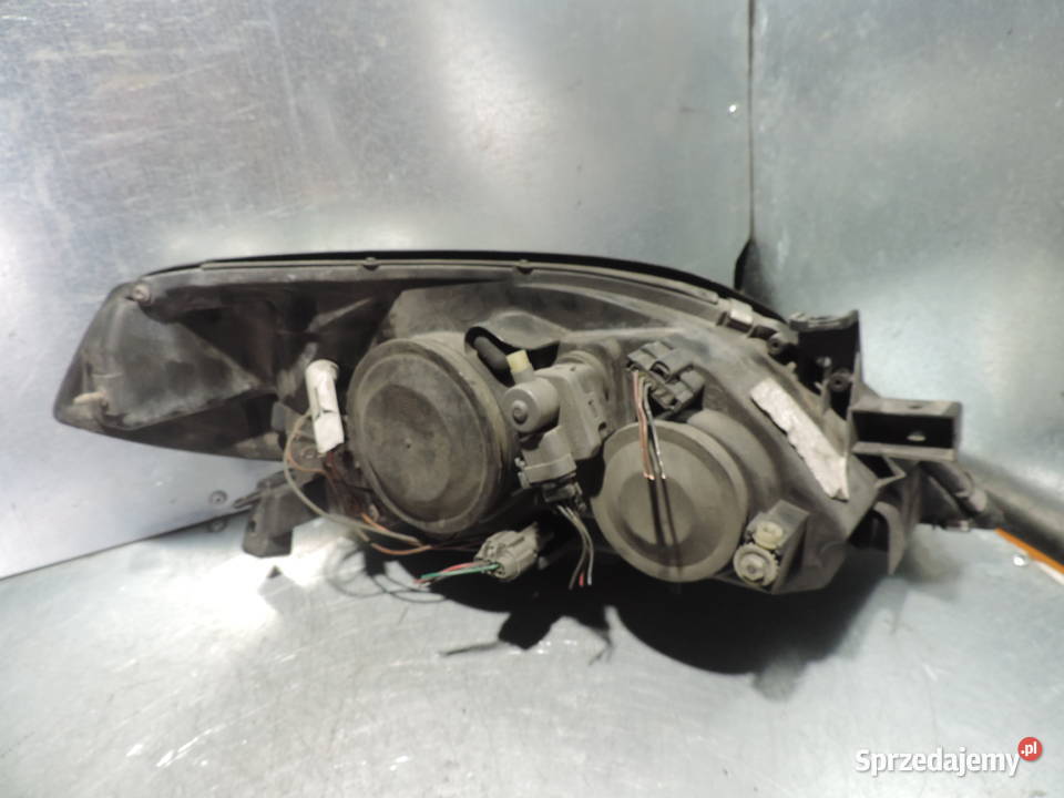 NISSAN PRIMERA P12 LAMPA LEWY PRZÓD PRZEDNIA osobowe Nowy Sącz