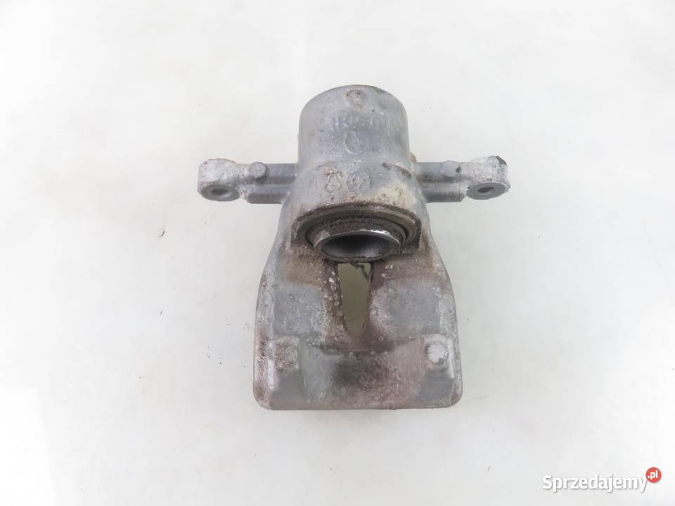 ZACISK LEWY TYŁ TOYOTA AVENSIS II T25 małopolskie