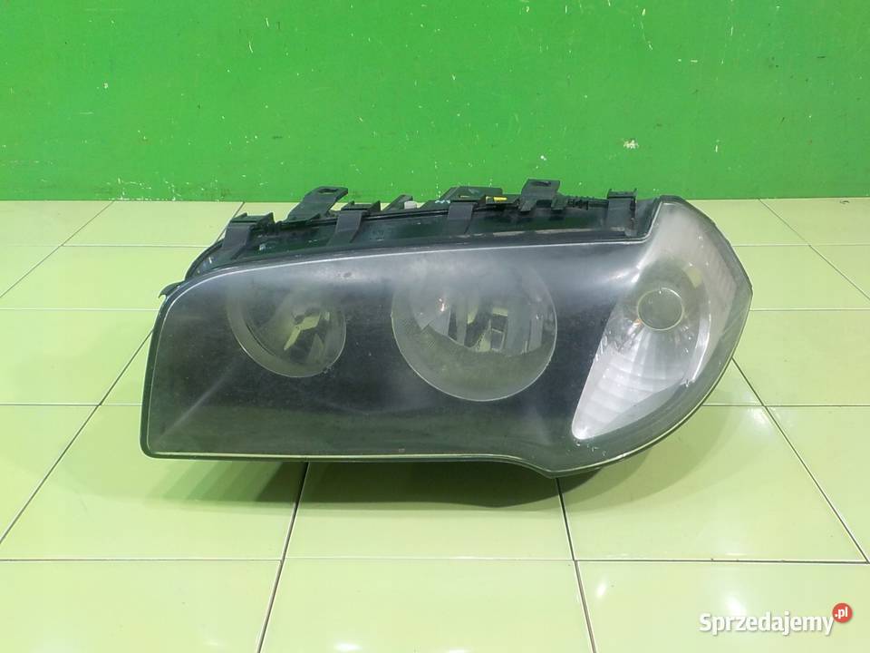 BMW X3 E83 25 B AUT 06r lampa lewa przod Lampy przednie mazowieckie Suków