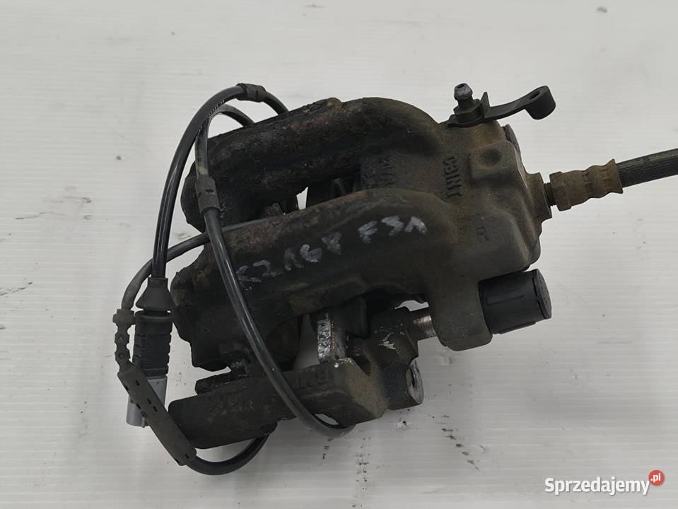 ZACISK PRAWY TYŁ BMW F31 20D LIFT osobowe