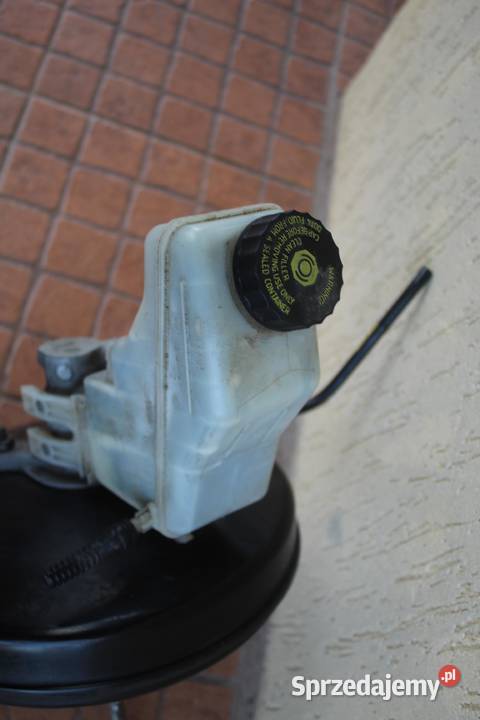 SERWO POMPA HAMULCOWA OPEL CORSA D 10 55701939