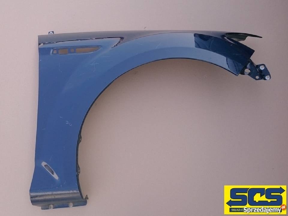 FORD MONDEO IV BŁOTNIK PRAWY PRZÓD PRZEDNI 0714 Bieleń