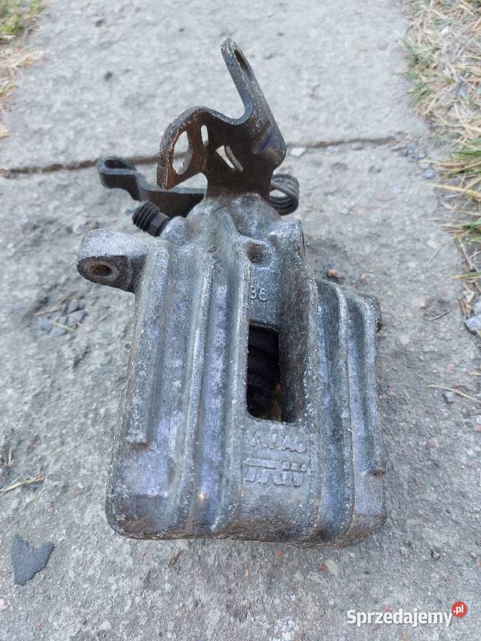 Vw Golf VI 20tdi tylny zacisk hamulcowy orginał Tyszowce