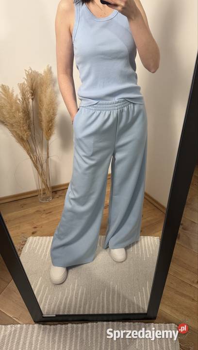 Błękitne spodnie dresowe wide leg miękkie Długie Ostrzeszów