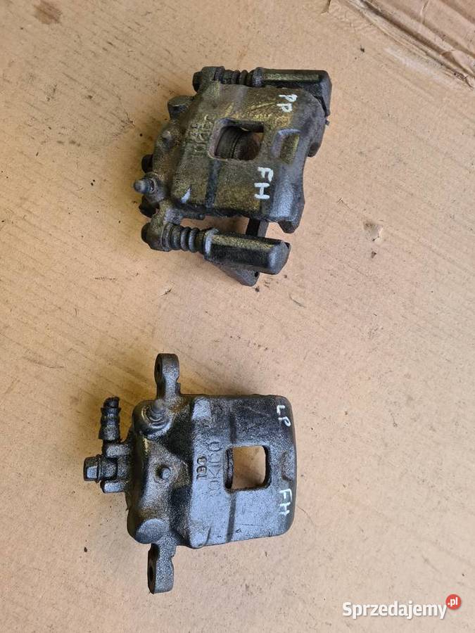 Suzuki Ignis FH 0003 zaciski hamulcowe zacisk