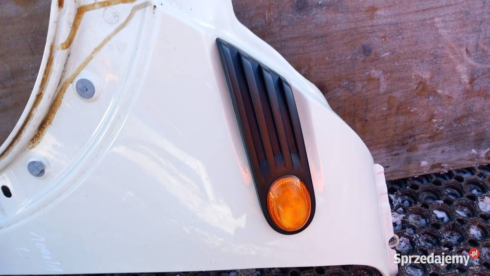 MINI COOPER D R56 BŁOTNIK PRZÓD LEWY 8500 Zbierkowo