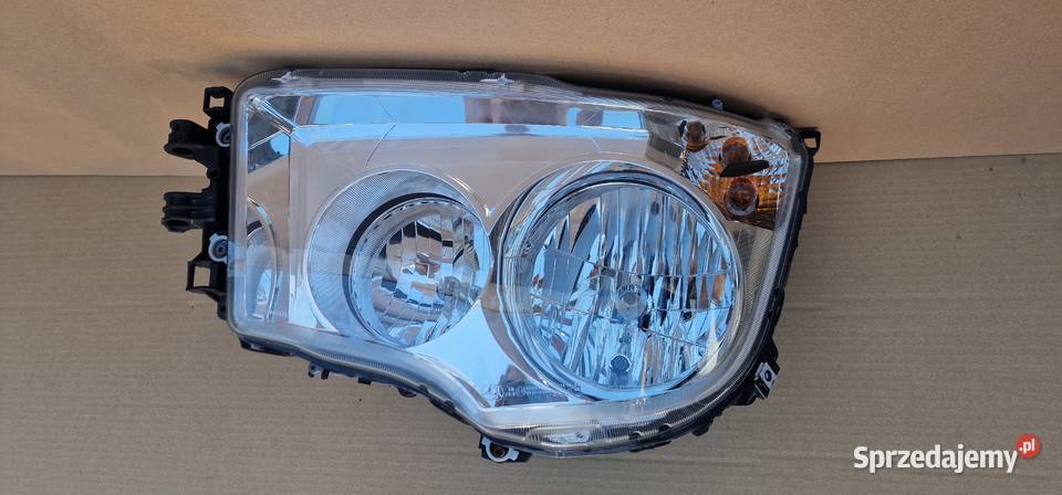 MERCEDES ANTOS AROCS REFLEKTOR LAMPA LEWA Bieleń