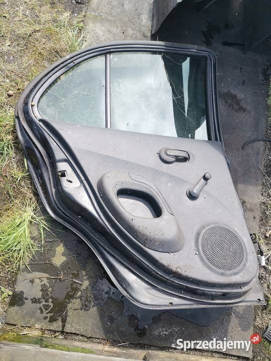 Drzwi lewy tył nissan mikra części blacharskie Czerwionka-Leszczyny sprzedam