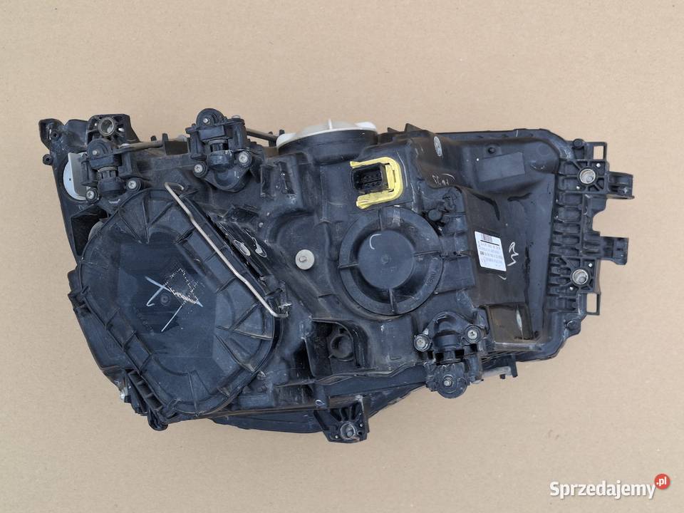 MERCEDES AROCS REFLEKTOR LEWY LAMPA LEWA Bieleń