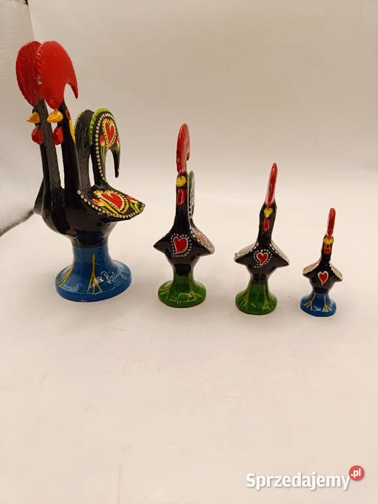 Zestaw czterech metalowych kogutów ptaków
