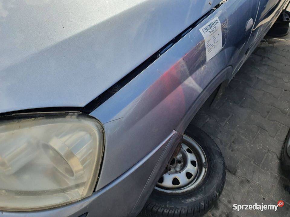 BŁOTNIK LEWY PRZÓD OPEL CORSA C L163 Lipno