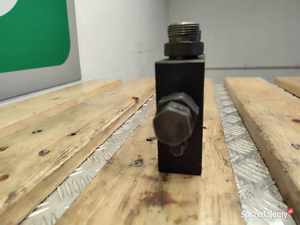 Zamek hydrauliczny siłownika R930058466 łyżki Wilkowo