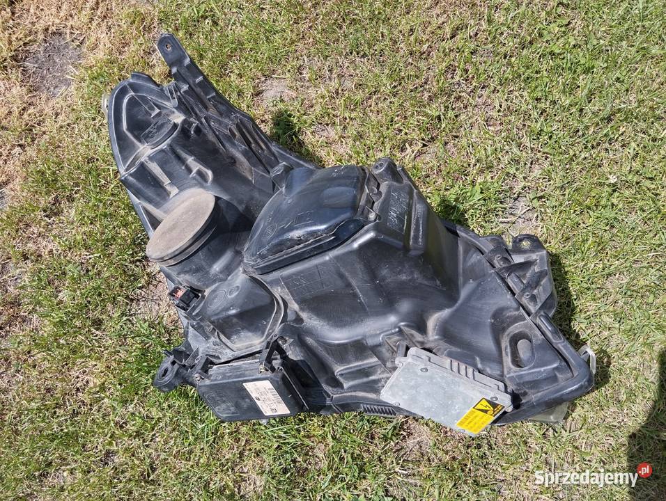 Lampa Opel Astra H III lewy przód BiXenon Kamieniec