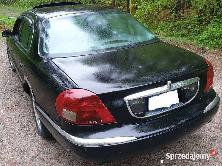 Lincoln Continental 46 zderzak szyba felgi koła benzyna