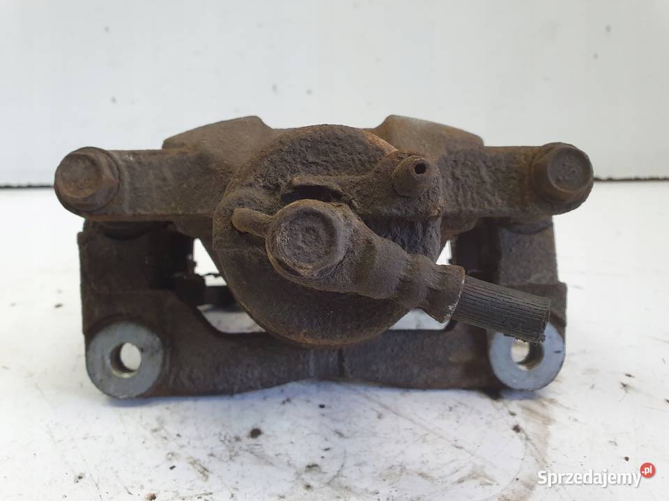 Toyota IQ PRAWY PRZEDNI ZACISK HAMULCOWY przód Rudka