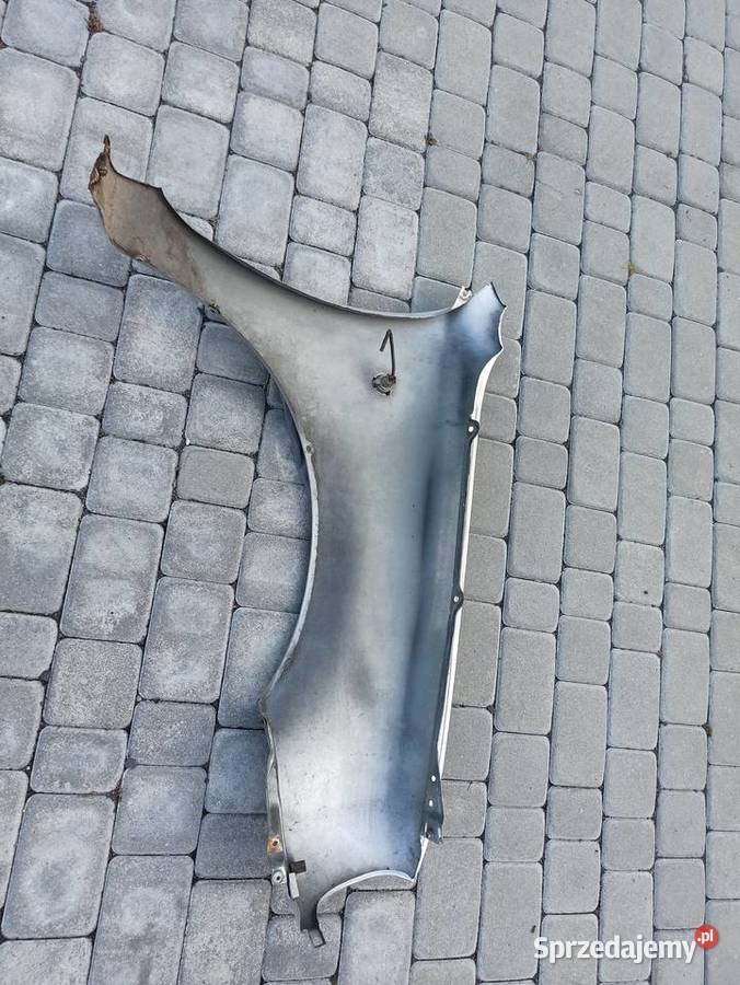 Nissan Micra K11 błotnik lewy przód srebrny Bolesławiec sprzedam