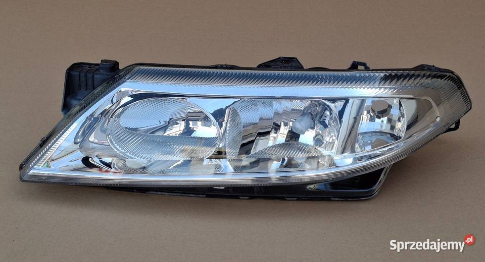 RENAULT LAGUNA II REFLEKTOR LEWY LAMPA LEWA Bieleń