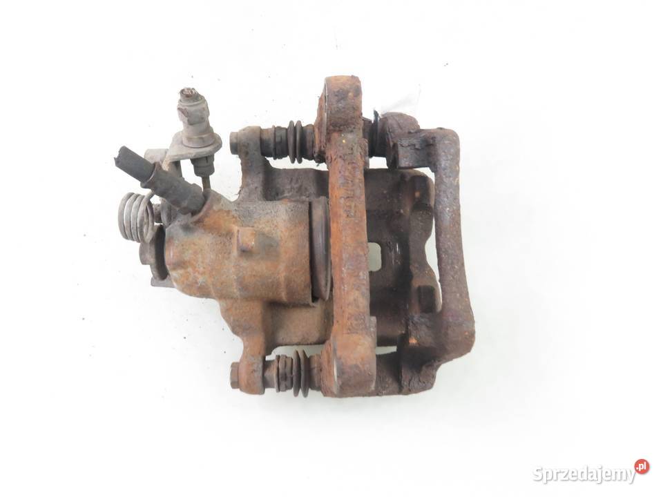 ZACISK PRAWY TYŁ RENAULT TRAFIC II