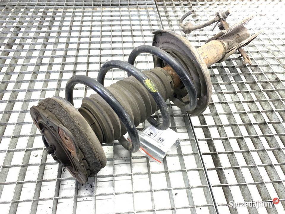 AMORTYZATOR PRAWY PRZÓD ZE SPRĘŻYNĄ RENAULT