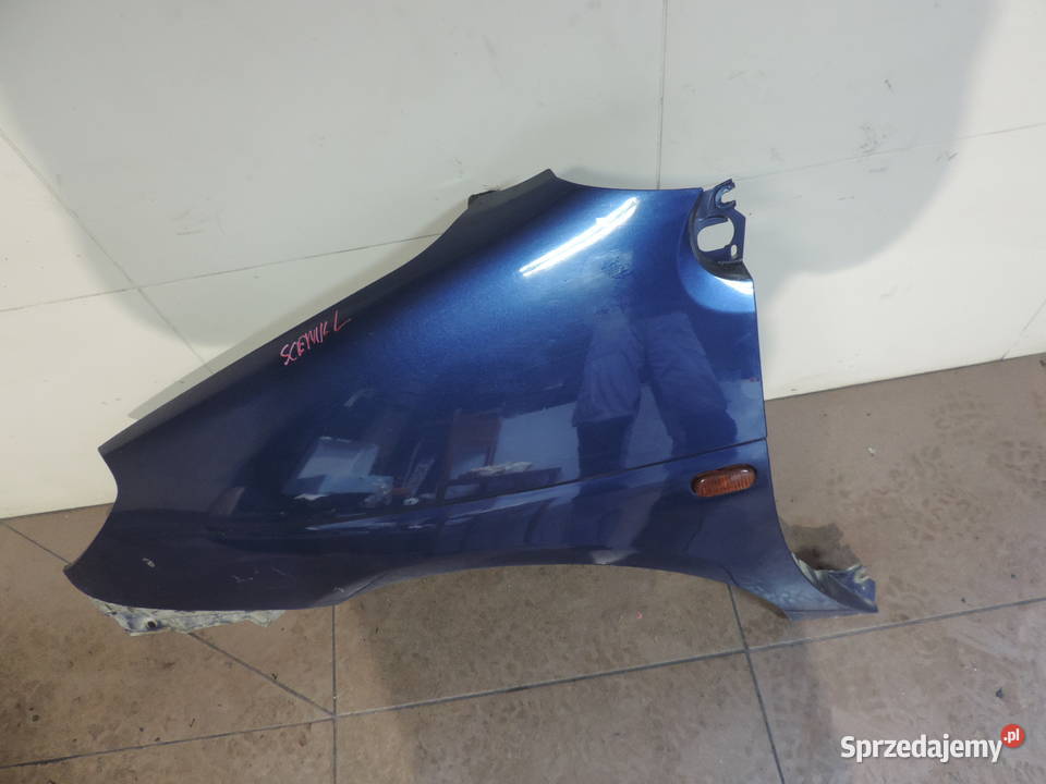 BŁOTNIK LEWY PRZEDNI RENAULT SCENIC 1 FL TED44 Błotniki Nowy Sącz