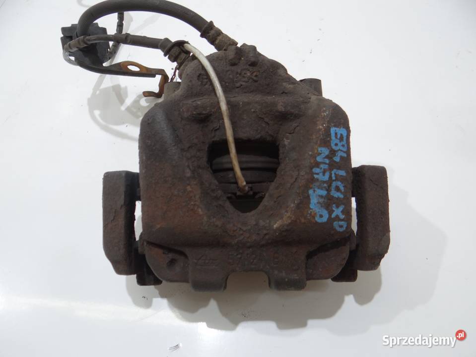 ZACISK HAMULCOWY XDRIVE LEWY PRZÓD BMW X1 E84 Strzyżewice