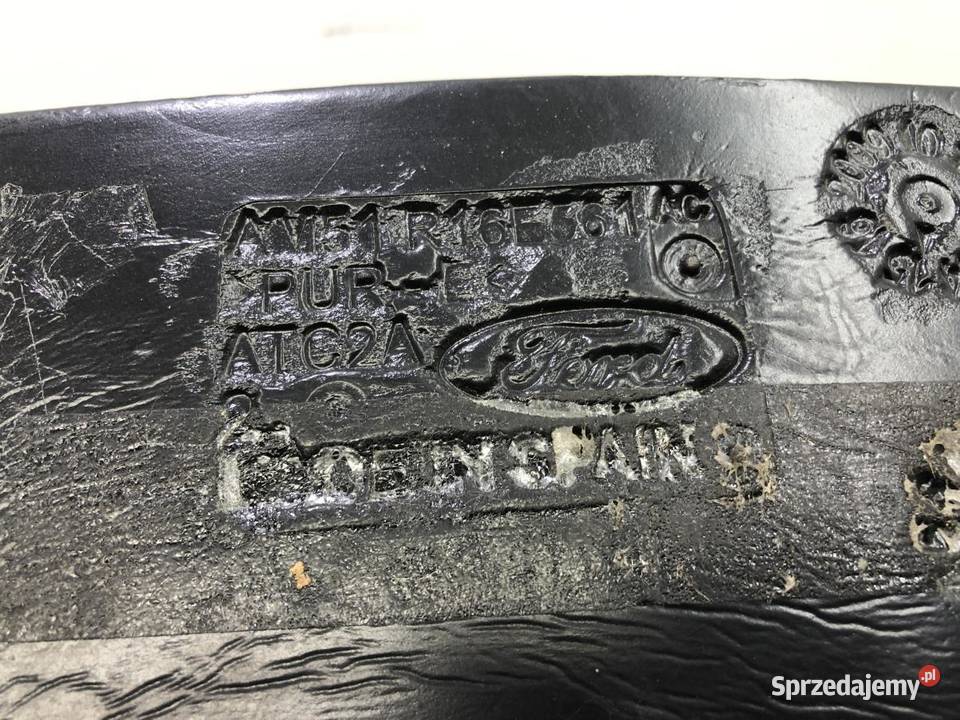 WYGŁUSZNIE BŁOTNIKA AM51R16E561 LEWE FORD C II