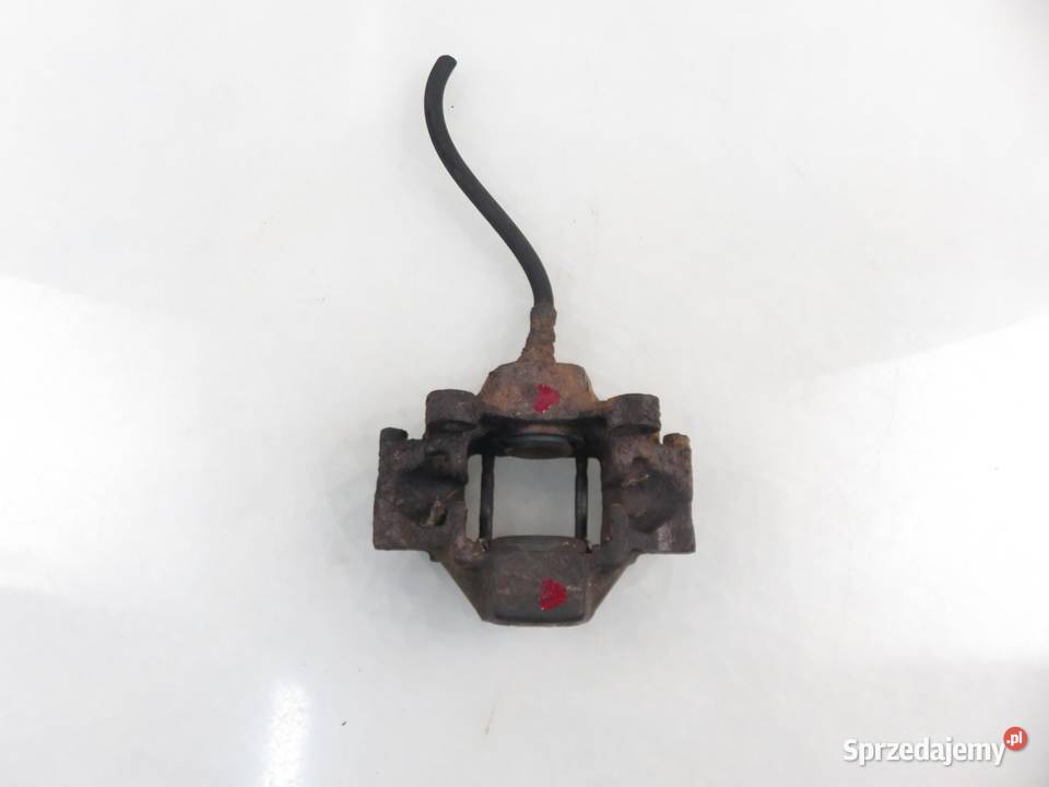 ZACISK PRAWY TYŁ MERCEDES W124 250 D sprzedam