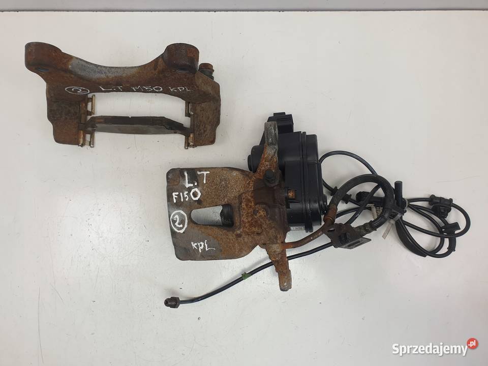 Ford F150 27 35 V6 15 ZACISK HAMULCOWY LEWY TYŁ