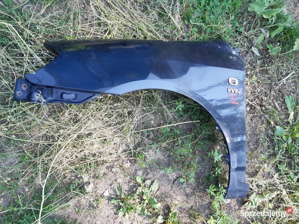 Corolla E12 Blotnik lewy przod oryginal Mińsk Mazowiecki