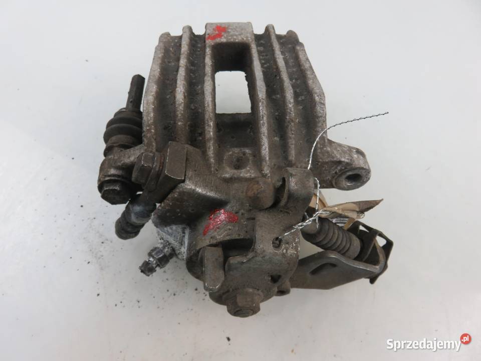 ZACISK PRAWY TYŁ SKODA OCTAVIA I 19 TDI ASZ