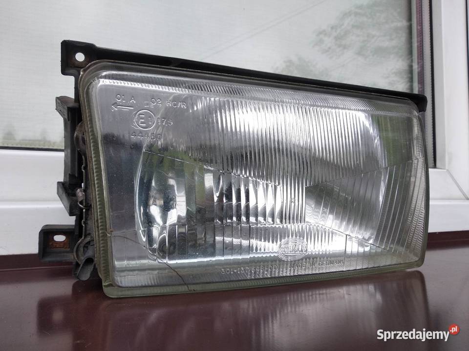 VW Polo II 86c2f lampa przednia prawa reflektor Sieradz