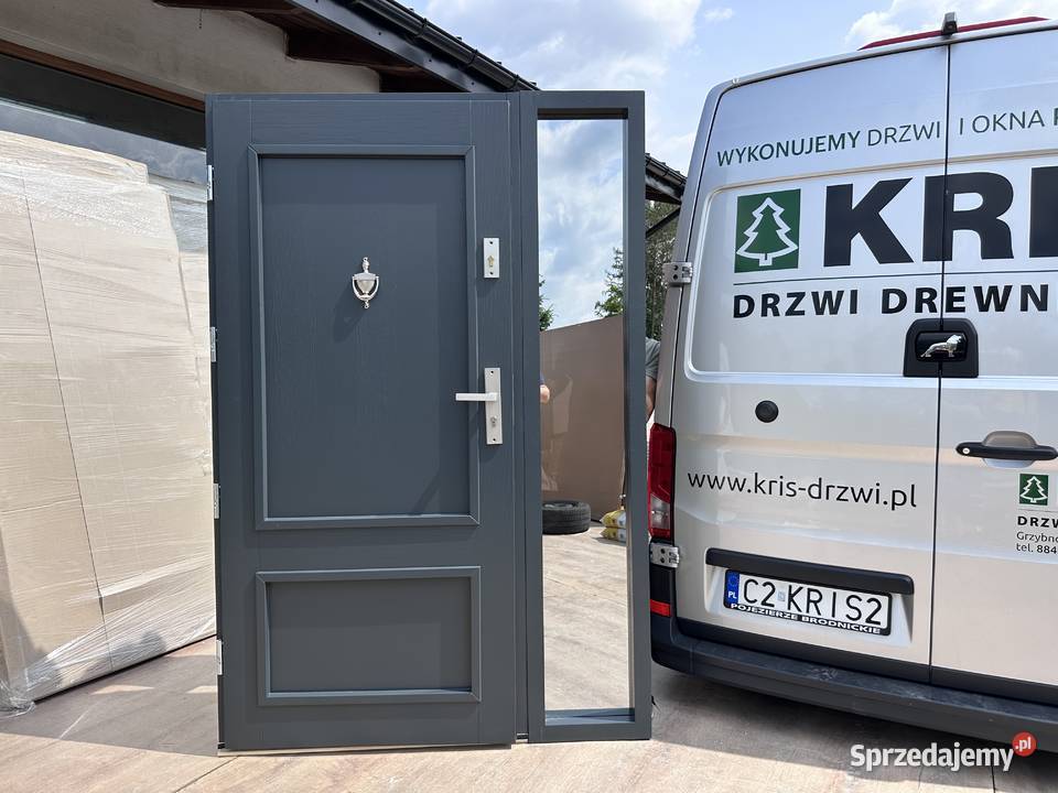 Drzwi zewnętrzne drewniane z doświetlem montaż Wrocław