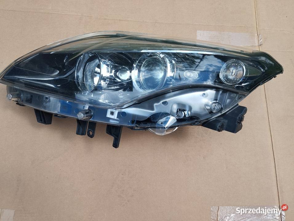 Laguna iii 3 lift lampa reflektor lewy oryginał osobowe łódzkie
