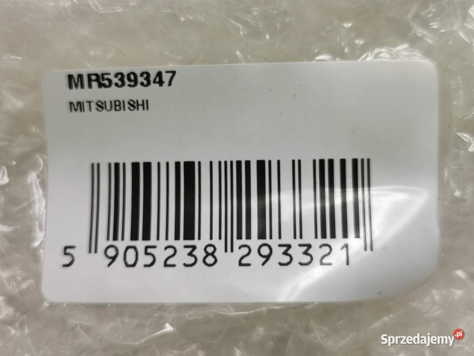 OSŁONA LAMPY CHROM LEWY TYŁ MITSUBISHI PAJERO