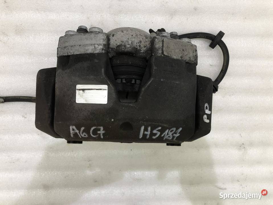 ZACISK PRAWY PRZÓD AUDI A6 C7 30TDI