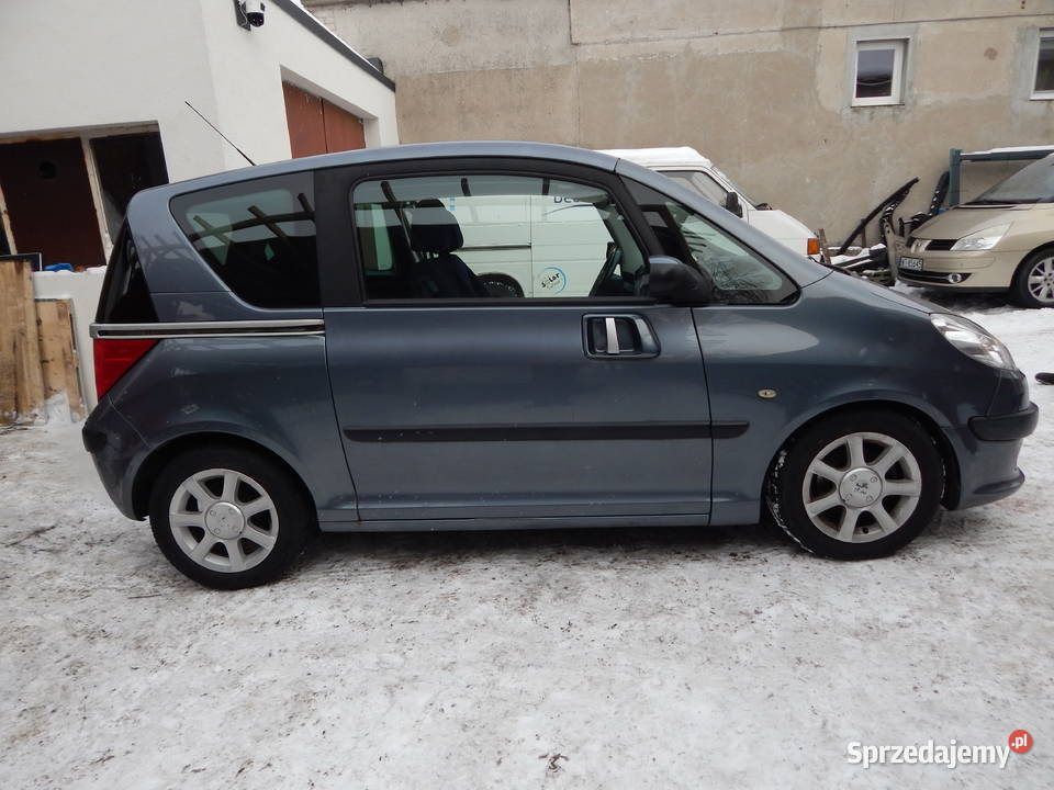 PEUGEOT 1007 BŁOTNIK PRAWY PRZEDNI EZW Warszawa