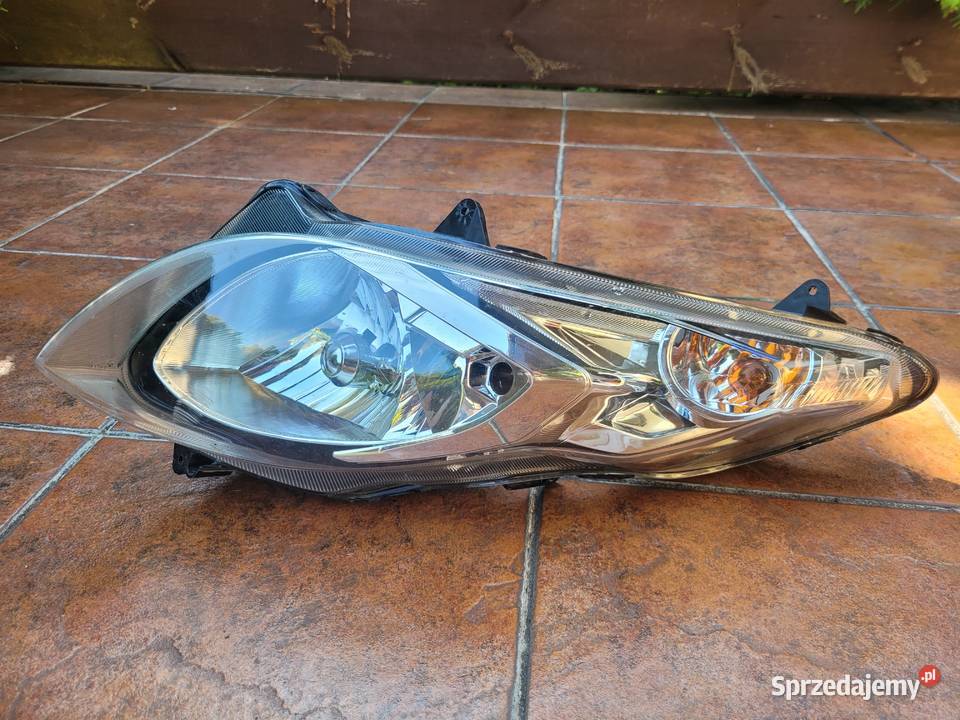 Suzuki Burgman K7K13 400 reflektor lampa przód Reflektory i halogeny Piła