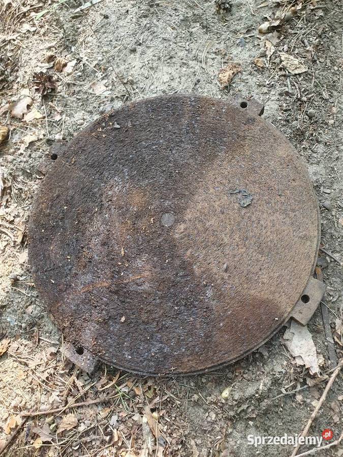 Żeliwne włazy okrągłe tarcze robocze starej Warszawa