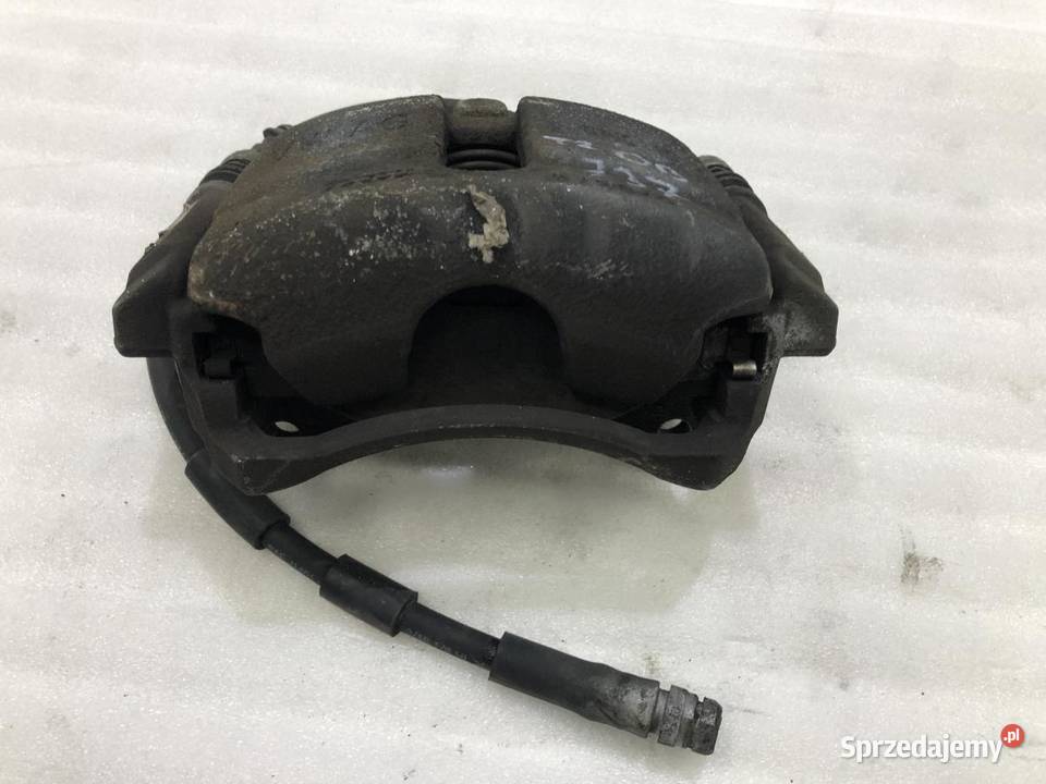 ZACISK LEWY PRZÓD VOLKSWAGEN TOURAN III