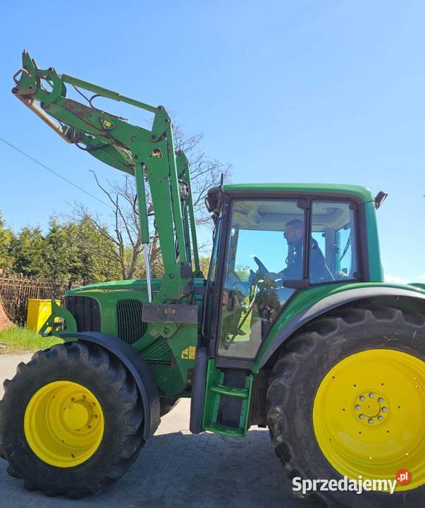 John Deere 6320 z ładowaczem czołowym John Deere Różyny