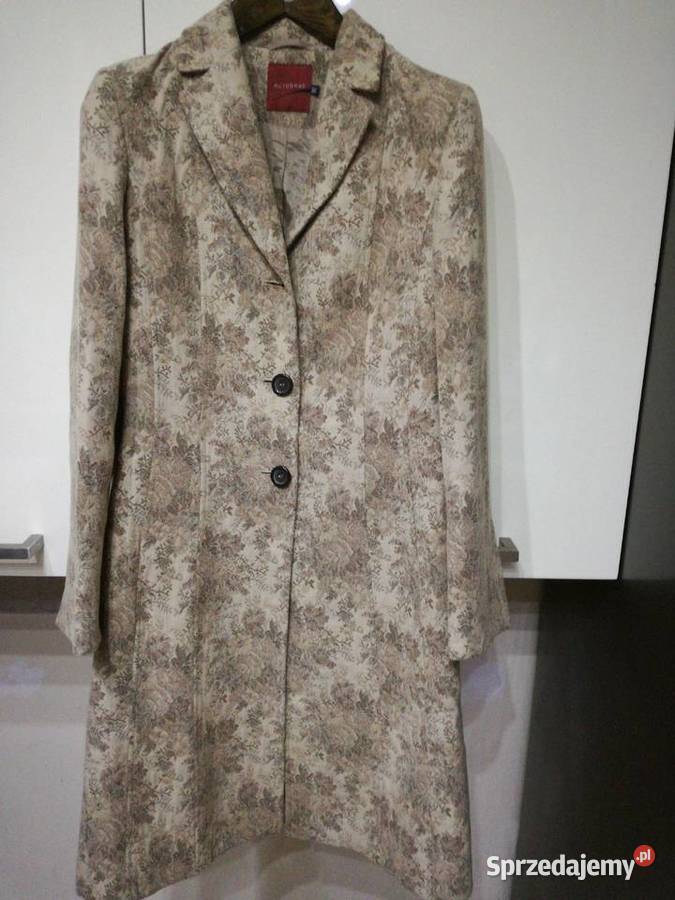 Płaszcz damski w kolorze beżowo brązowym Autog Lublin