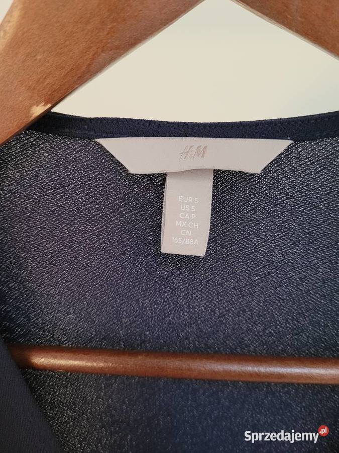 Granatowa rozkloszowana sukienka dekolt w serek Liszki