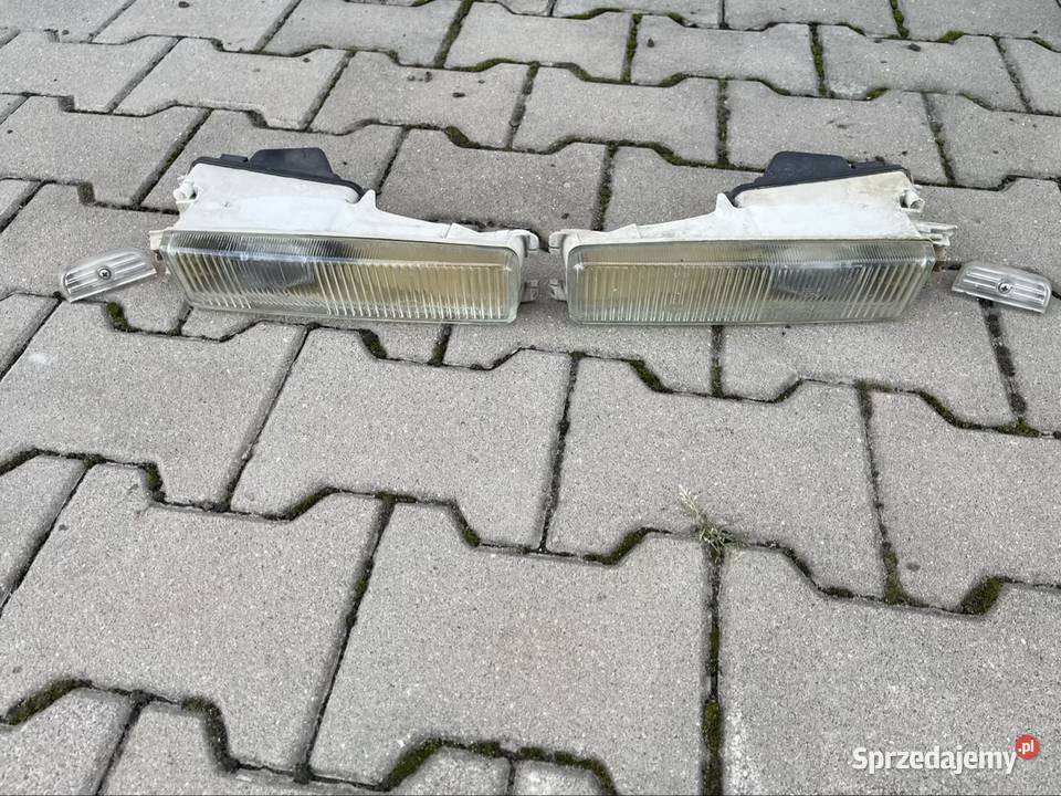 Halogeny Audi 80 b4 komplet z zaślepkami HELLA Chełm