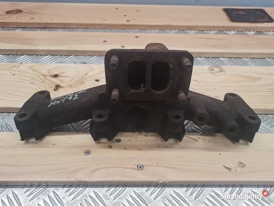 Kolektor wydechowy Mecelac 12 MXT Cummins 4BT39C Rolnictwo sprzedam