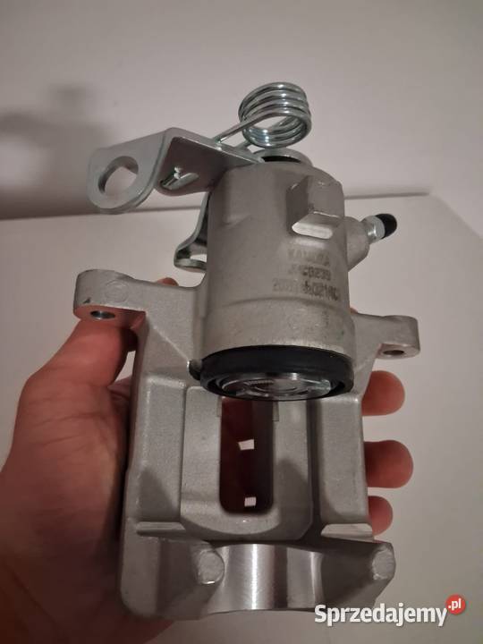 Nowy zacisk hamulcowy lewa strona tył VW Golf IV