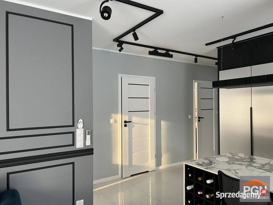 sprzedaży mieszkania 63m2 3pokojowe parter Międzywodzie