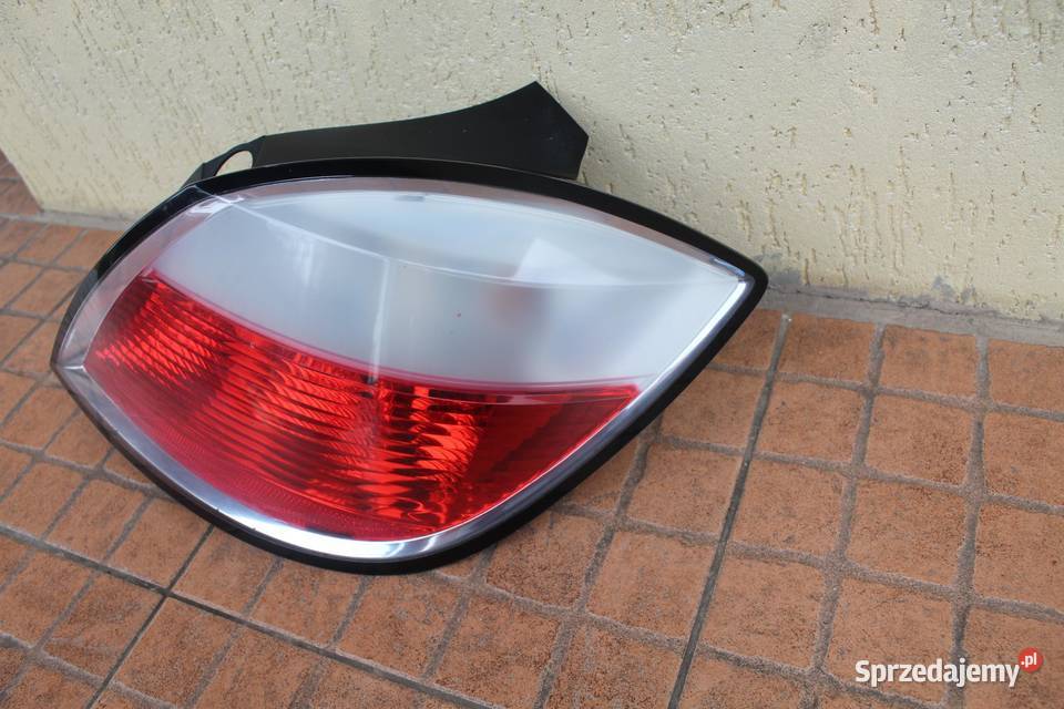 LAMPA PRAWY TYŁ TYLNA OPEL ASTRA H 24451837