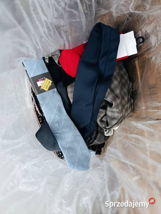 Koszule krawaty spodnie suknie marki Kowal