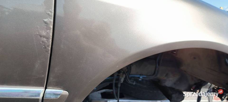 BŁOTNIK PRAWY PRZÓD VOLKSWAGEN PHAETON LR7R Lipno